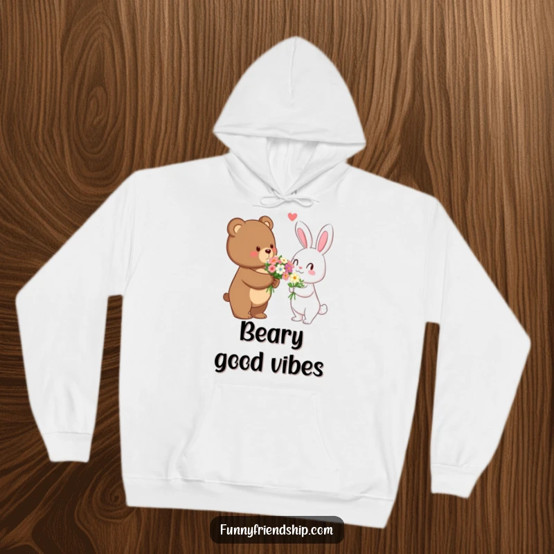 Funny bear offering flowers to a rabbit on a cozy hoodie, depicting warmth, romance, and gentle humor in apparel.