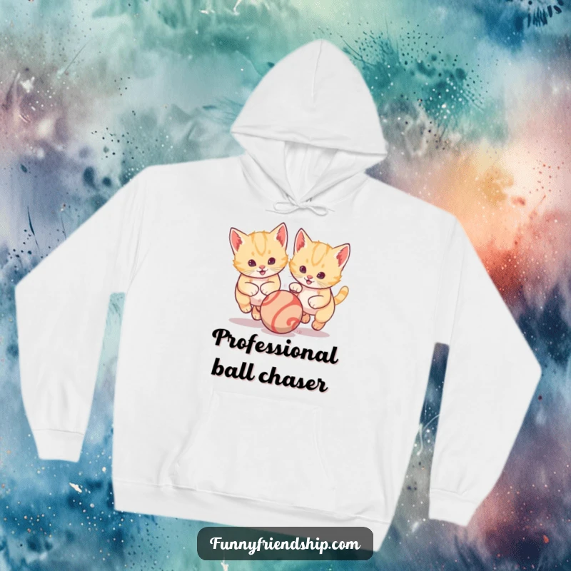 Funny hoodie illustrating two cute kittens hilariously chasing a bouncing ball, radiating warmth, playfulness, and adorable pet antics.