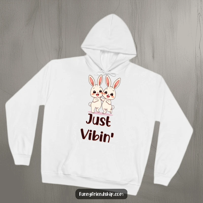Funny Hoodie: Two cute bunnies with big smiles dancing joyfully, spreading warmth and cheer in a cozy, cuddly design.
